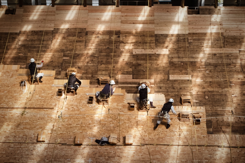 wood work, people, putting, togetherness, construction, high angle view, color, flooring, walking, shade, painting, group, light, travel, temple, carpenter