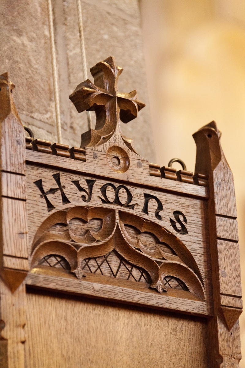 hymns, god, wooden, wood, ornate, history, no people, row, old, wood - material, outdoors, faith, worship, the past, communication, religion, place of worship