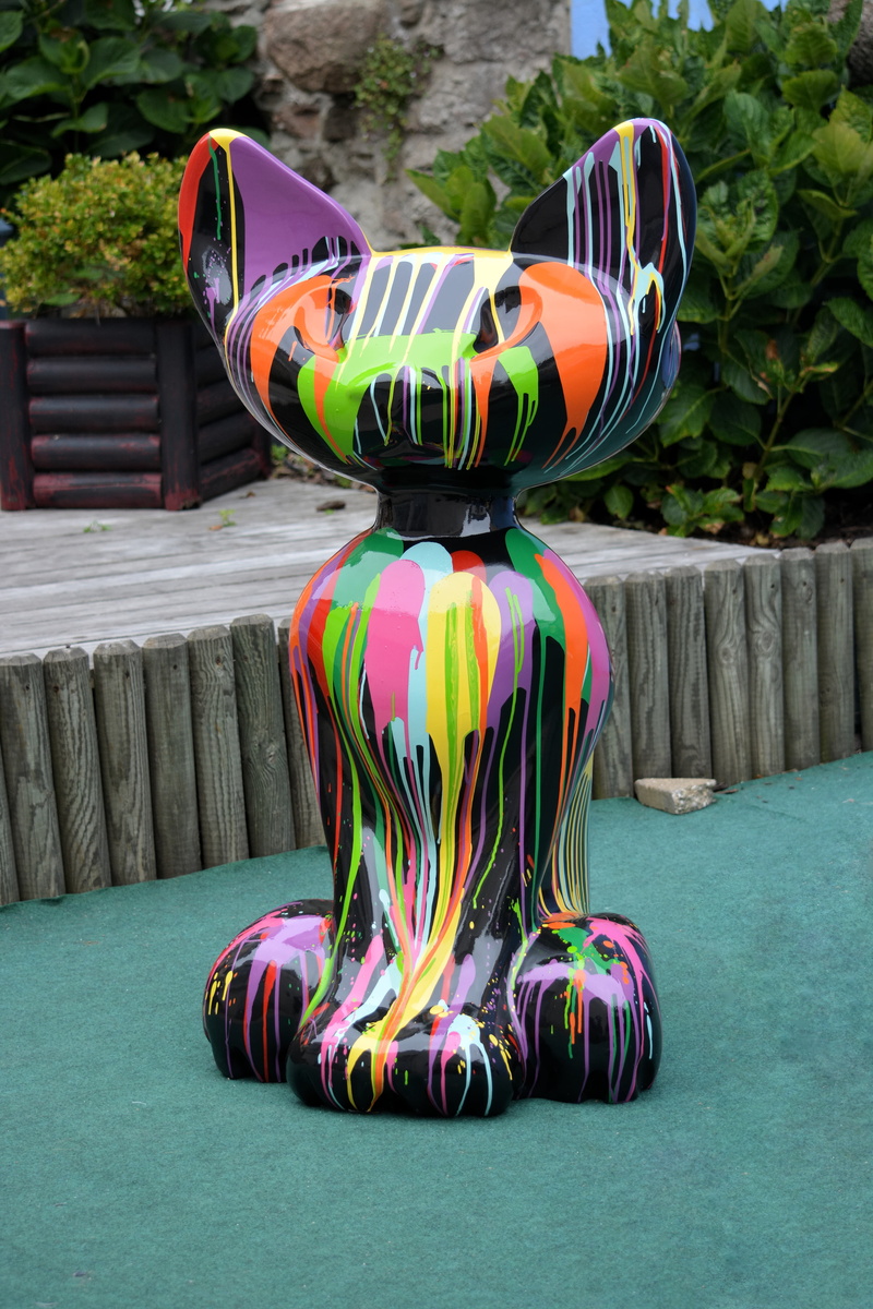 wheel, sculpture resin, toy, outdoors, inflatable, artistic, creativity, artworks, sport, rock, day, art and craft, large group of objects, ball, close-up
