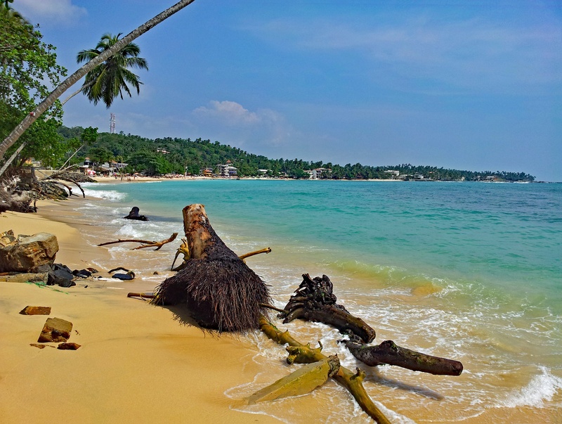 asia, sri lanka, sand, non-urban scene, rock, scenics - nature, island, tranquility, coast, beauty in nature, sky, ocean, driftwood, beach, unawatuna, sea