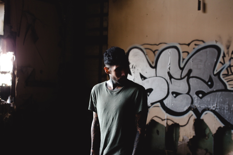 casual clothing, indoors, one person, alone, 5K, front view, adults only, wall - building feature, dark, adult, shirt, people, painted, one man only, leisure activity