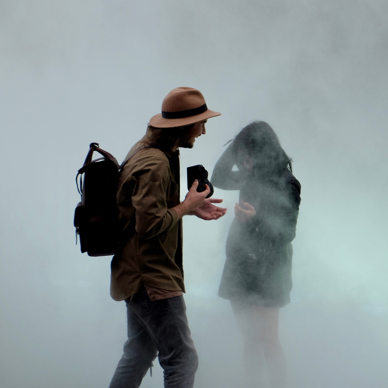 risk, white, man, black, men, brown, studio shot, violence, bag, males, front, holding, black coat, woman, walking, hat, side view, real people, social issues