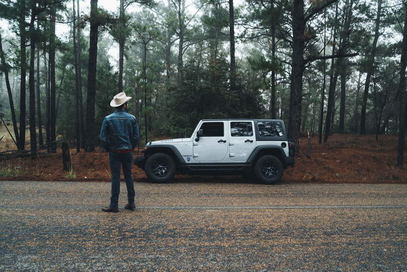 people, tree, 4x4, white, motor vehicle, car, full length, off-Road Vehicle, casual clothing, leisure activity, adult, one person, transportation, nature