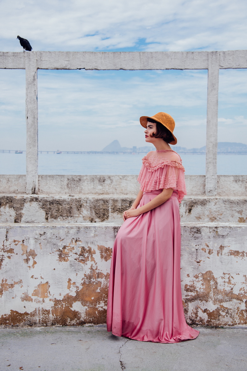 daytime, side view, full length, clothing, cloud, animal, built structure, wall, woman, pink, adult, cloud - sky, length, fashion, outdoors, females, leisure activity