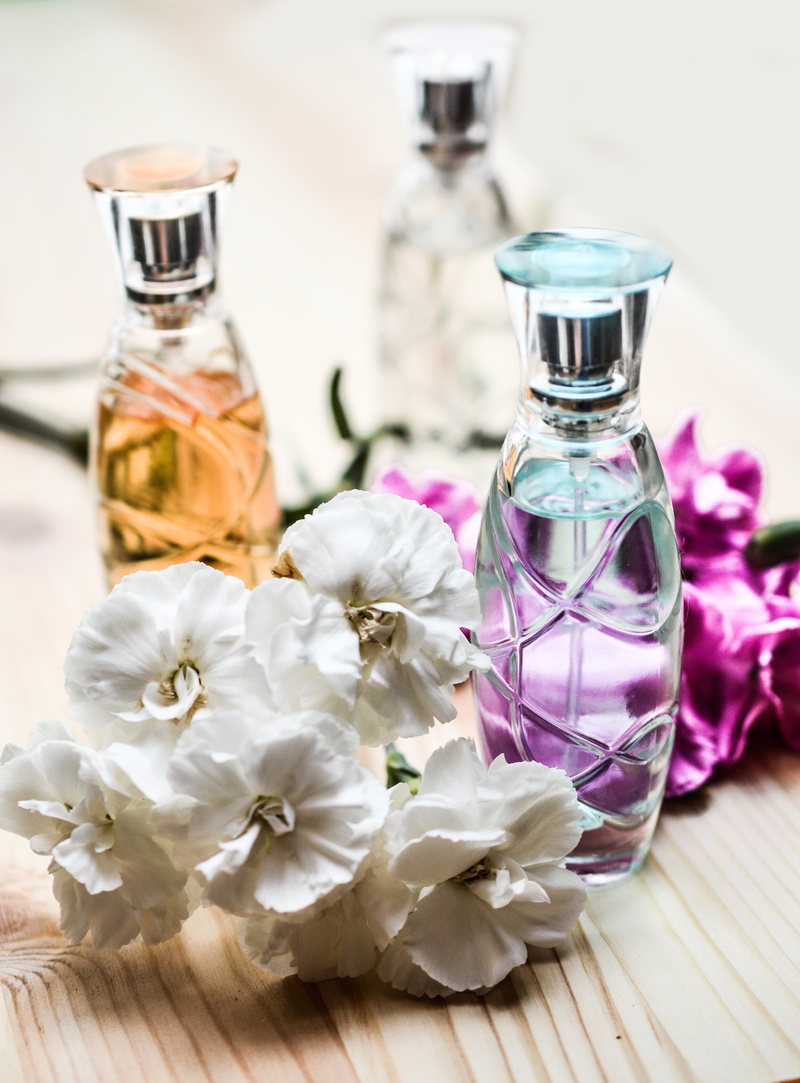 romance, transparent, perfume bottle, flower head, indoors, fragrance, glass, smell, freshness, cosmetics, perfume, no people, nature, plant, elegance