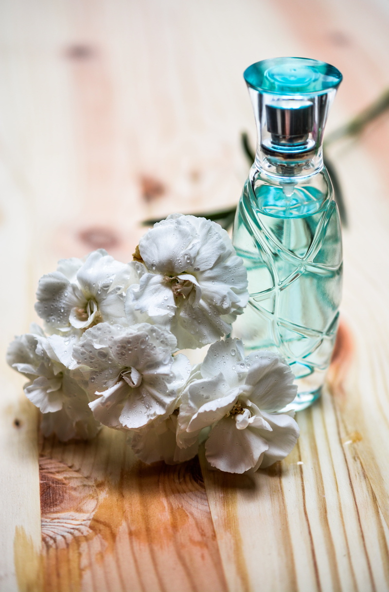 indoors, container, wood - Material, brown, smell, aroma, romantic, personal accessory, creativity, surface, no people, blue, romance, spray, fragrant
