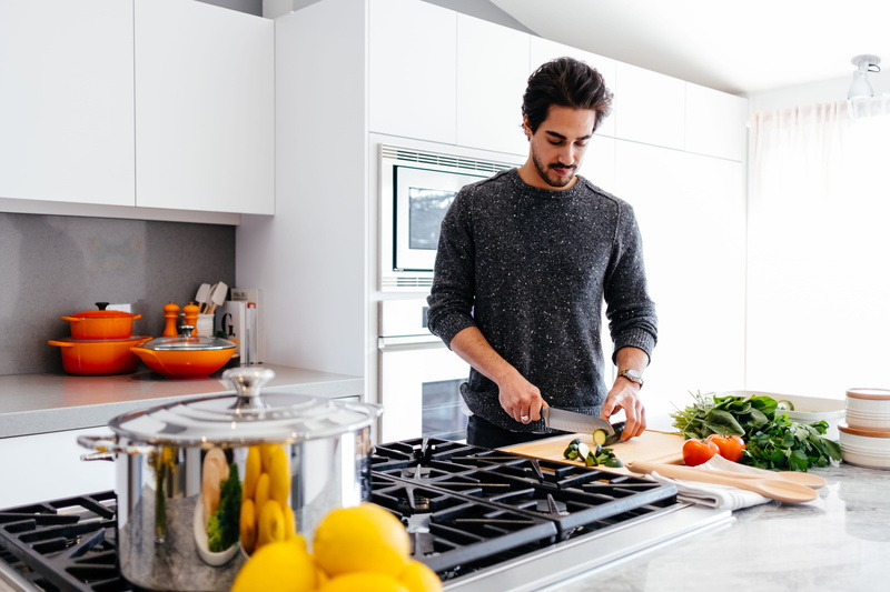 cooker, oven, man, preparing food, cook, standing, person, stove, food and drink, le creuset, domestic life, one person, fruit, room, plant, preparation