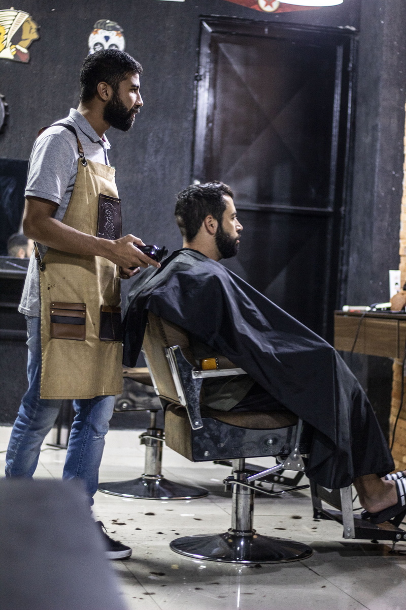 apron, 5K, young men, people, side view, business, hairstyle, leisure activity, barber, jeans, healthcare, working, room, stainless, seat, facial hair