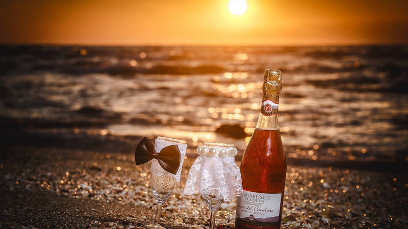 luxury, sunset, labeled, water, bottle, beer, white, bowtie, refreshment, container, clear, glass - material, outdoors, focus on foreground, sea, beer - alcohol