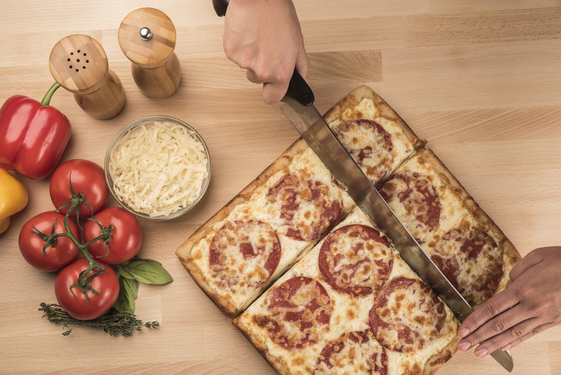 indoors, human body part, beside, top, one person, food, holding, chicago style pizza, high angle view, square pizza, slice, produce, fruit, mushrooms