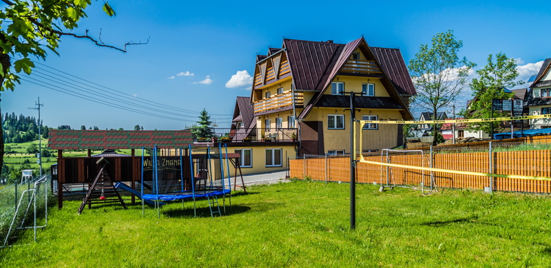 building, grass, multi colored, architecture, no people, plant, front or back yard, blue, playground, building exterior, summer, tree, built structure