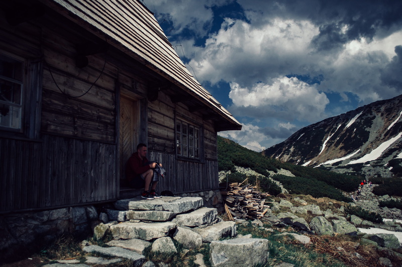 thinking, cloudy, green, beauty in nature, built structure, mountain, real people, zakopane, leisure activity, architecture, rock - object, spring, rock