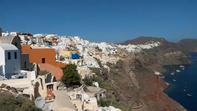 sea, residential district, architecture, crowd, blue, mountain, clear sky, building exterior, sky, town, high angle view, fira, built structure, city, 2K