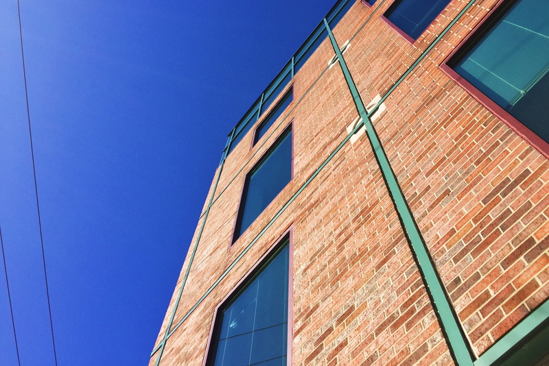 office building exterior, building, apartment, united states, low angle view, modern, built structure, residential district, city, blue, nature, sunlight