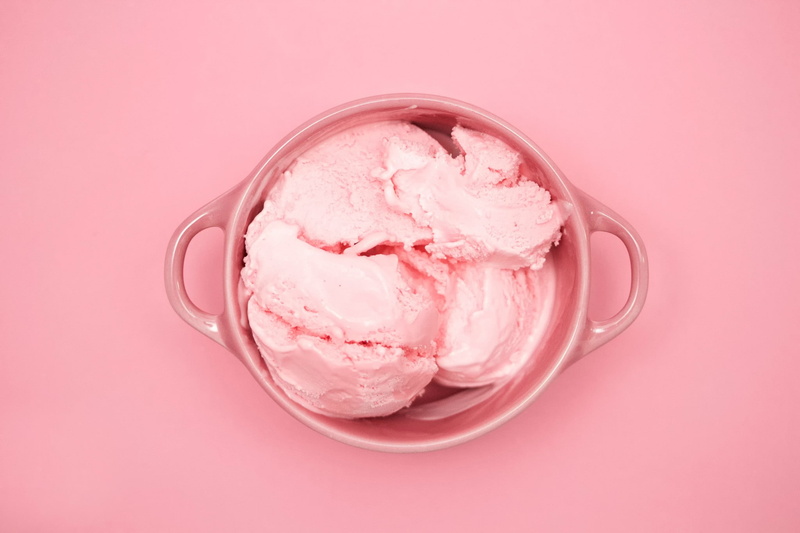 dairy product, pink color, cup, food, ice cream, sweet food, temptation, food and drink, no people, vanilla ice cream, colored background, indulgence, frozen food