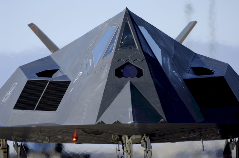front view, single-seat, low angle view, airplane, mode of transportation, built structure, architecture, plane, building exterior, fuel and power generation