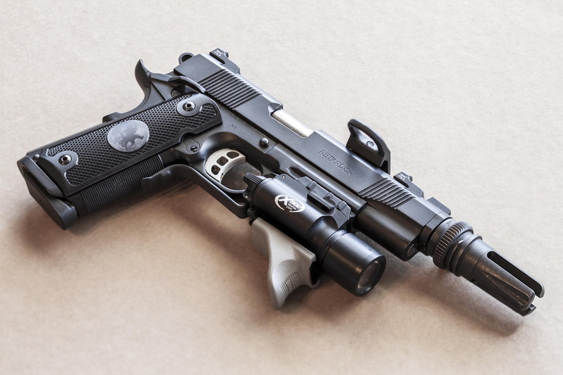 aiming, communication, semi, danger, shooting A Weapon, indoors, warning sign, social issues, handgun, gun, military, table, black color, ammunition, studio shot
