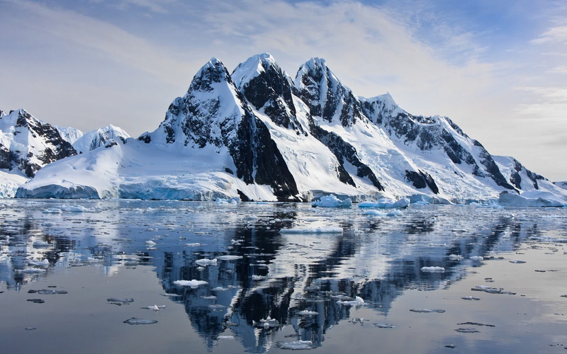 sea, cold temperature, scenics - nature, sky, non-urban scene, snow, extreme weather, winter, tranquil scene, outdoors, no people, cloud - sky, snowcapped mountain