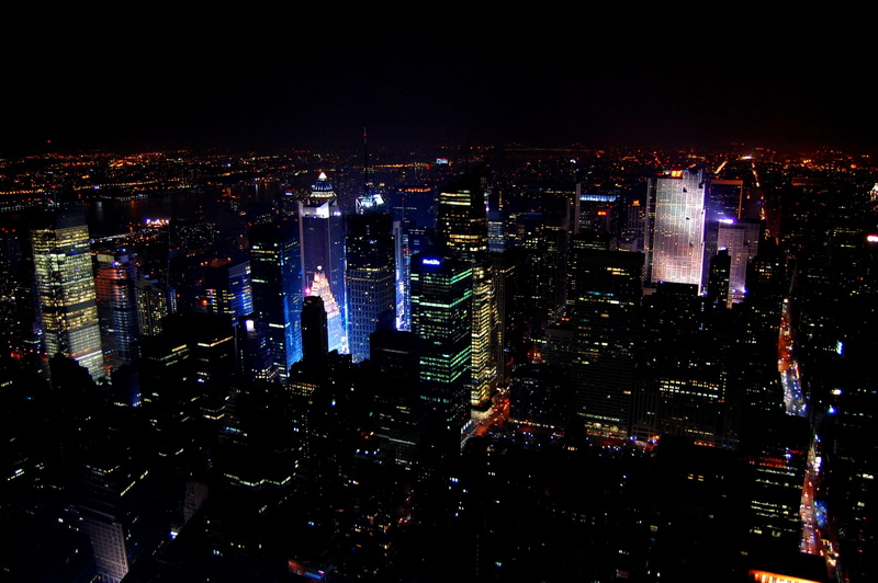 outdoors, aerial view, urban, city, skyscraper, high angle view, building, cityscape, nightlife, built structure, crowd, architecture, financial district