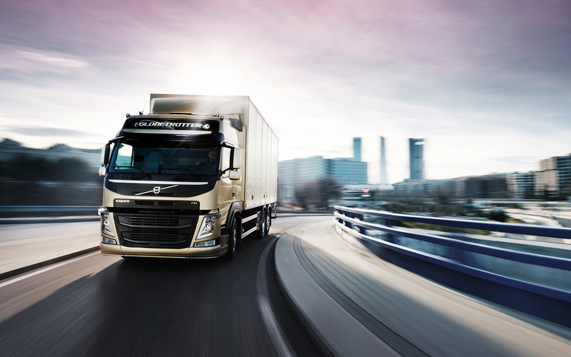 cargo Container, vehicle Trailer, traffic, public transportation, building exterior, shipping, land Vehicle, on the move, the city, asphalt, vanishing Point