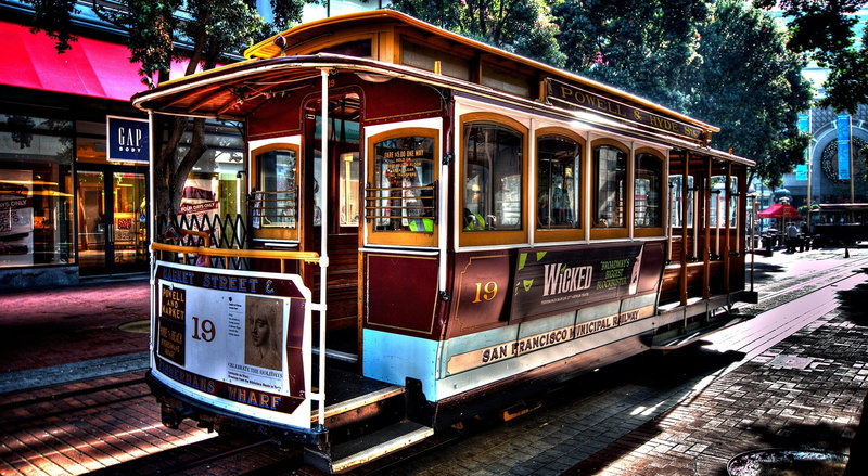 Creative, incidental people, tree, mode of transportation, cable car, san, tramcar, rail transportation, travel, public transportation, outdoors, brown