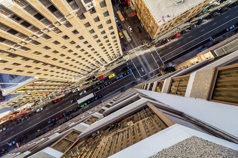 transportation, city, residential district, high angle view, mode of transportation, street, architecture, road, built structure, rail transportation, building