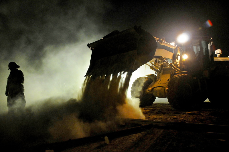 outdoors, mode of transportation, construction, labor, site, motion, equipment, rear view, construction industry, building, men, lights, workers, smoke - physical structure