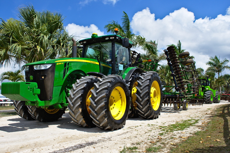 road, palm tree, tractor, vehicle, power, tropical climate, nature, day, no people, cloud - sky, mode of transportation, agriculture, spanish lookout, large