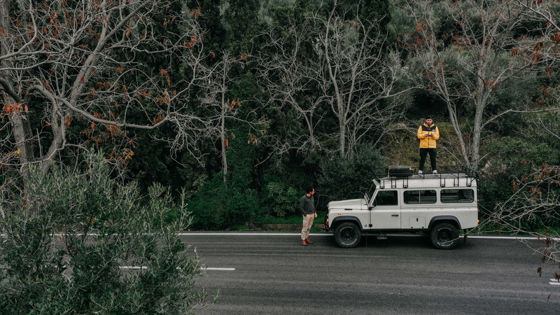 travel, front, automobile, motor vehicle, lefterisk, vegetation, real people, standing, defender, people, dronephotography, outdoorphotography, human, landrover