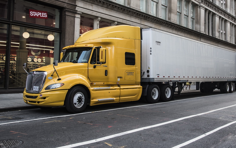 city, street, concrete, america, building exterior, driver, yellow, public transportation, sign, motor vehicle, parked, no people, car, daytime, professional