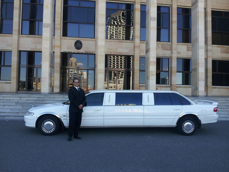 white, men, one person, mode of transportation, luxury, adult, building exterior, transport, built structure, transportation, city, limo, day, vehicle