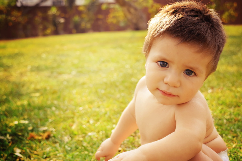 child, young, one person, looking at camera, innocence, shirtless, green, nature, plant, cute, 5K, focus on foreground, day, babyhood, grass, baby, portrait