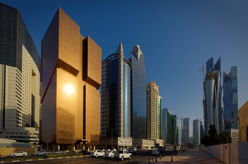 cityscape, outdoors, office, mode of transportation, financial district, no people, travel destinations, sky, clear sky, Qatar, built structure, urban skyline