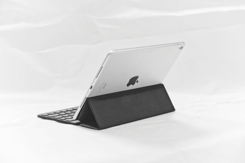apple product, wireless technology, technology, tech, computer equipment, open, grey, white color, black, minimalistic, keyboard, day, high angle view