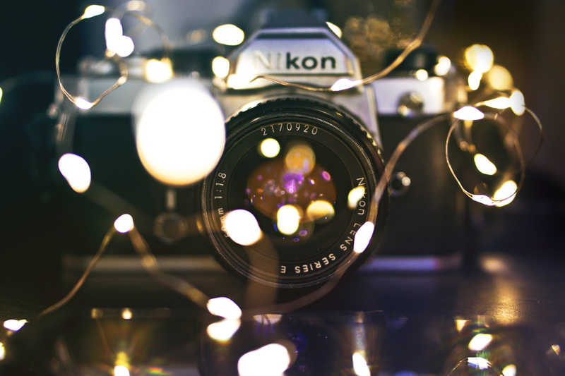 circle, candle, gear, night, focus on foreground, arts culture and entertainment, string light, camera, macro, dslr, analog, nikon, dark, product, no people