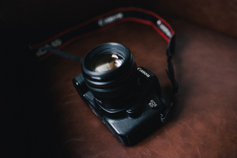zipper, adapter, electronics, 5K, machine, single object, black color, canon, strap, flower, eos, skin, camera - photographic equipment, high angle view