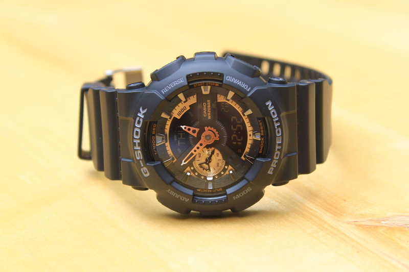 indoors, Casio, time, shape, metal, shock, yellow, analog, cityscape, close-up, clock, wrist, fashion, geometric shape, G-Shock, high angle view, single object