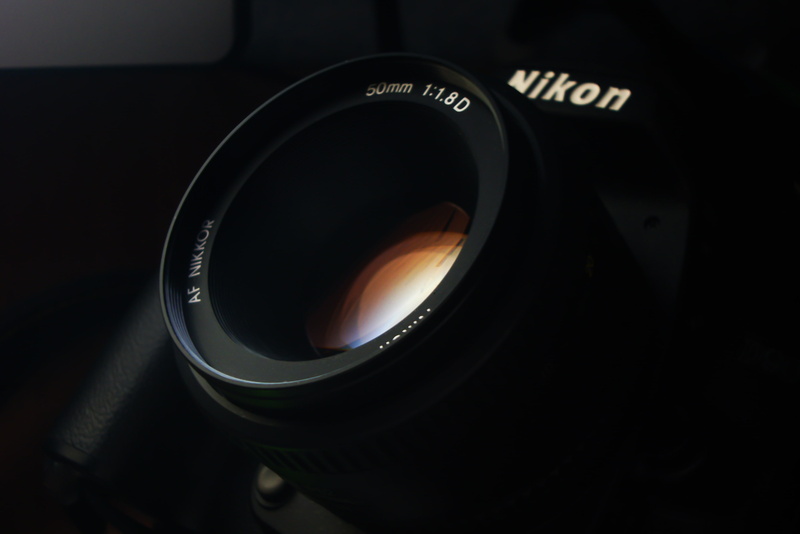 2K, 50 mm, optical instrument, camera, close-up, the camera, digital camera, indoors, lens, full frame, black, camera - photographic equipment, studio shot