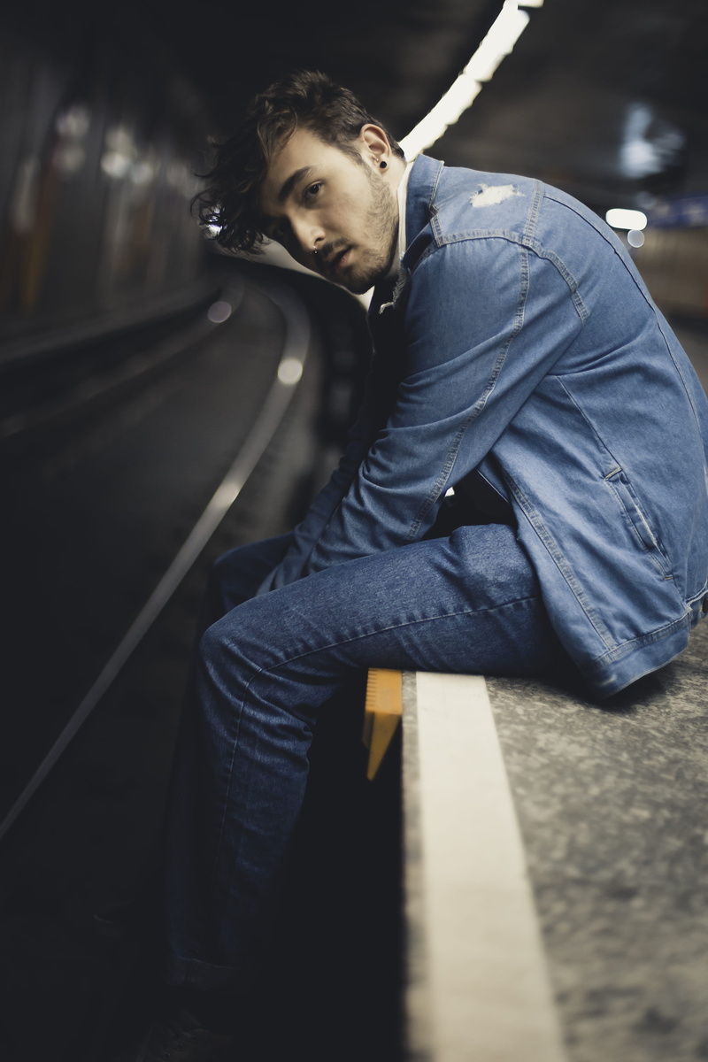 gray, 5K, man, three quarter length, wearing, denim jacket, good-looking, fashion, focus on foreground, blue, denim, one person, surface, pose, trendy