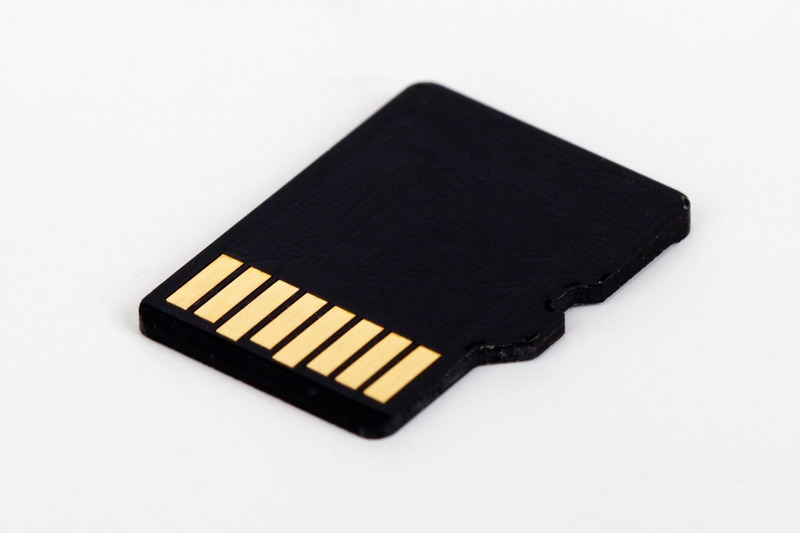 micro sd card, Sd Card, secure, pattern, white background, single Object, high angle view, indoors, media, cut out, close-up, no people, storage, tiny