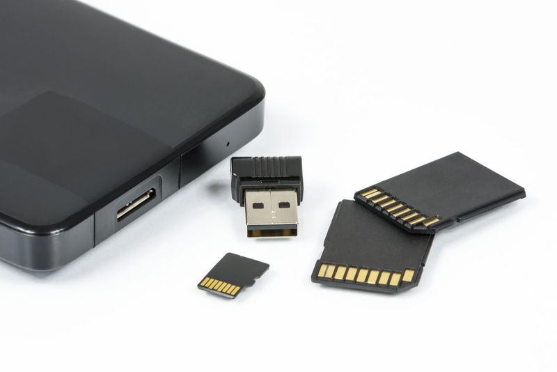 sd cards, studio shot, computer equipment, corporate business, white background, storage, white color, cut out, laptop, no people, technology, connection