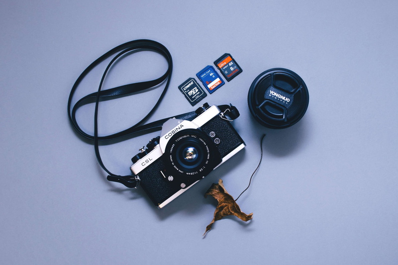 micro sd, camera film, retro styled, camera, antique, electronics, studio shot, leaf, high angle view, dry leaf, lens - optical instrument, digital camera