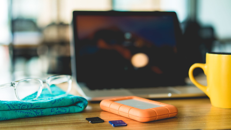 home office, sd card, computer, communication, hard drive, laptop, 5K, focus on foreground, office, table, coffee, wireless technology, furniture, computer network
