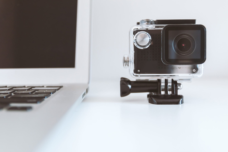 no people, computer equipment, white, macbook, besides, copy space, notebook, black, close-up, camera, action camera, indoors, liquid-crystal display, work