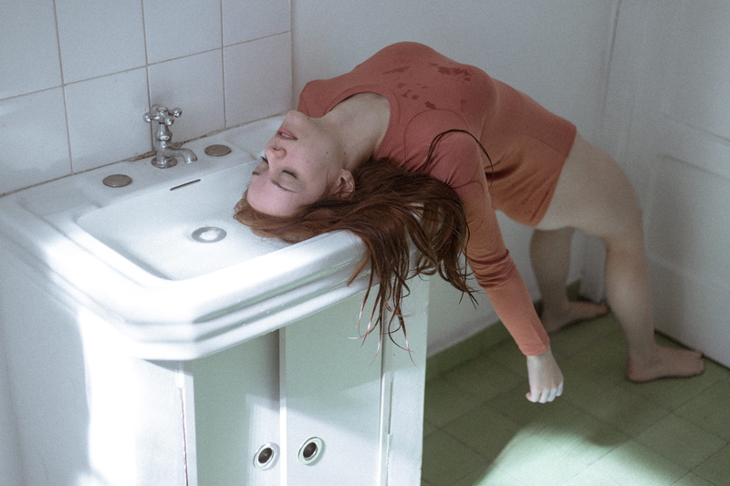 top, head in sink, brown, condition, people, wearing, domestic Bathroom, adults only, home Interior, female, sink, tile, bathtub, women, waking, young adult