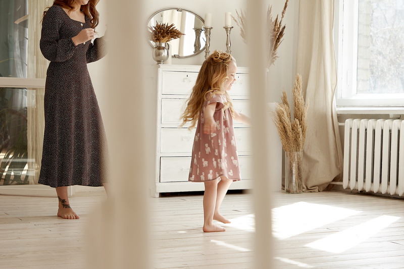 full length, two people, domestic room, fashion, daughter, beauty, mother and daughter, heater, mirror, adult, family, girls, mother, toddler, dress, hairstyle