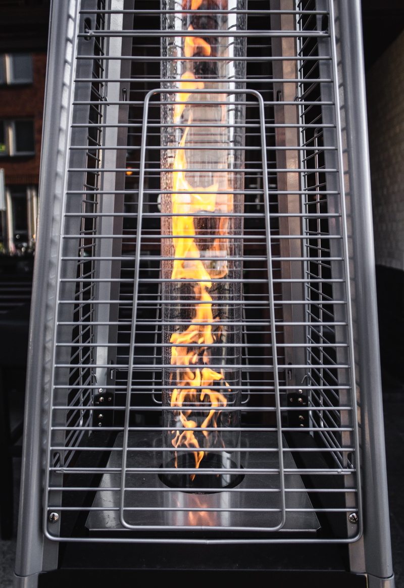 heat - temperature, 4K, meat, grid, appliance, food, grate, grille, flame, handrail, logo, food and drink, trademark, low angle view, focus on foreground