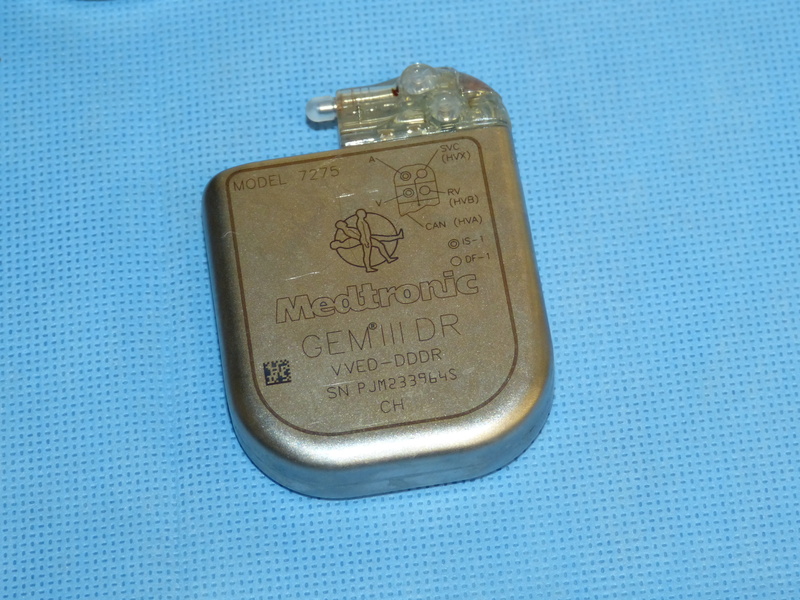 cardiac pacemaker, technology, clinic, canned food, hospital, text, indoors, communication, economy, operation, disease, single object, device, high angle view