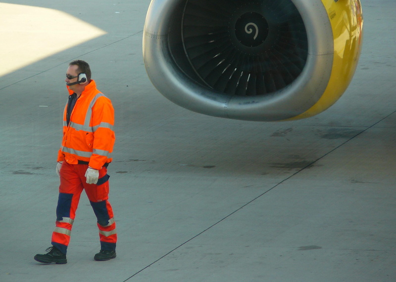 airplane, day, engine, flight, runway, white, tarmac, only men, front, occupation, safety clothing, control, 2K, start, person, air vehicle, airport, full length