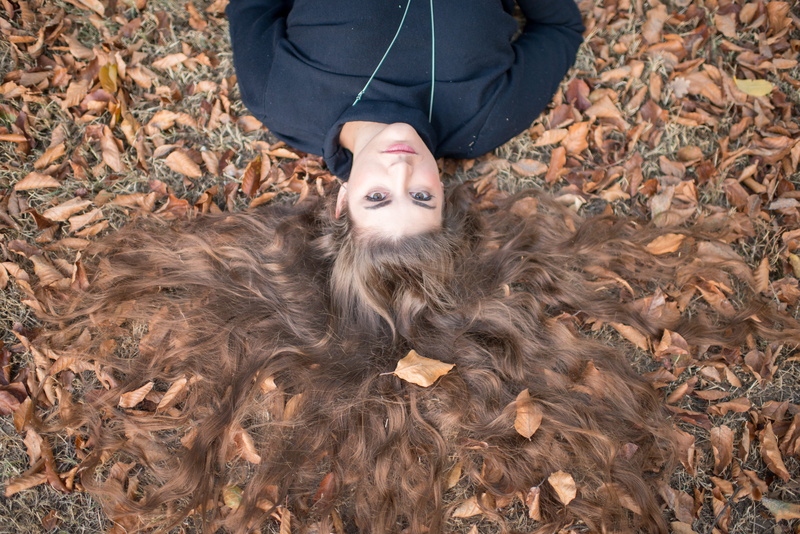 plant part, woman, front view, wearing, leaves, brown, photography, field, autumn, top, real people, adult, neck, nature, human body part, lay, 5K, women